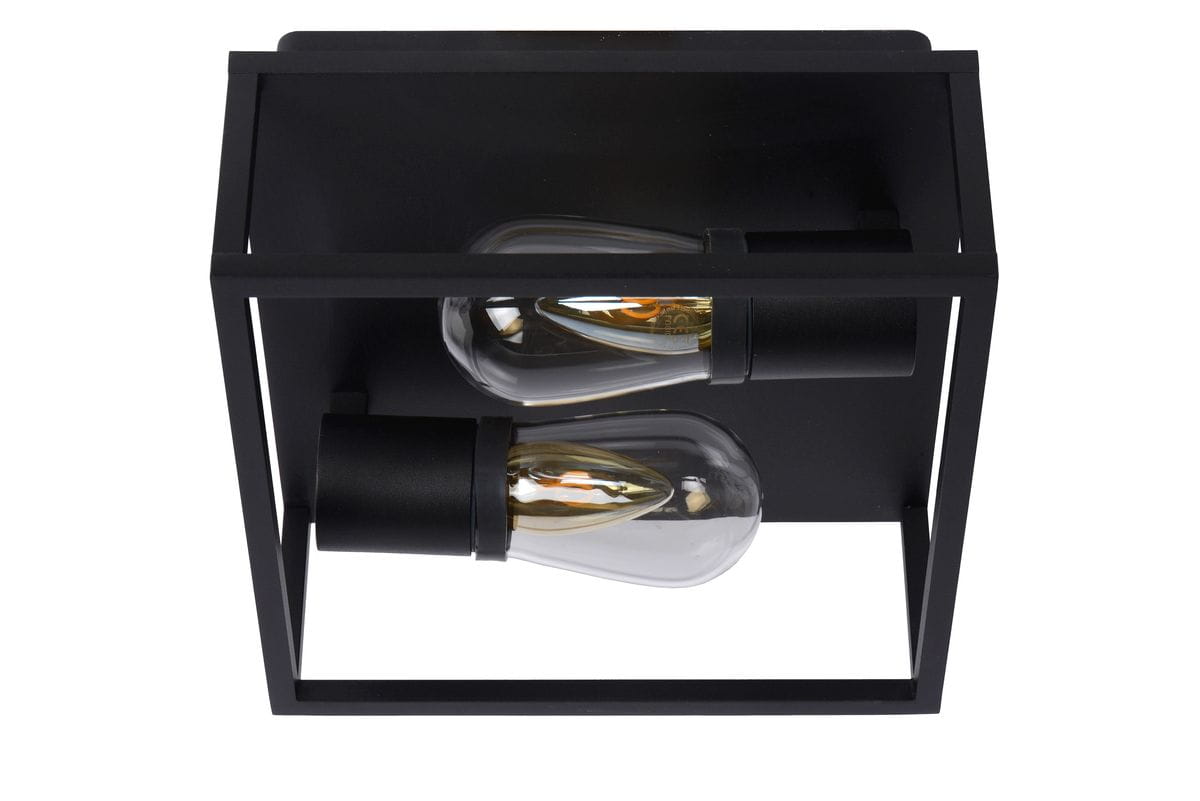 Carlyn IP54 lampa sufitowa 2-punktowa w kolorze czarnym. Produkt ma prostokątną, metalową obudowę z dwoma miejscami na żarówki, widoczny detal to przezroczyste klosze. Ujęcie z góry, zamontowana na suficie.