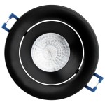 Okrągła oprawa oczko do zabudowy GU10 w kolorze czarnym. Ruchoma konstrukcja z przezroczystą soczewką wewnętrzną. Wyposażona w niebieskie mocowania, widoczna z góry, gotowa do montażu. Idealna do oświetlenia wnętrz.