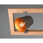Lampa wisząca Bell 4-punktowa w kolorze niklu antycznego. Posiada metalowy klosz z wewnętrzną złotą powłoką, montowana na drewnianej ramie. Widoczne elementy konstrukcyjne i źródło światła w centralnej części klosza.