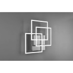 Mobile LED lampa sufitowa 3-punktowa w kolorze niklowym, z pilotem. Lampa składa się z trzech nakładających się prostokątnych ram w białym kolorze, zamontowana na ścianie w minimalistycznym stylu. Tło w odcieniu szarości.