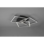 Czarna, 3-punktowa lampa sufitowa LED z pilotem, złożona z trzech geometrycznych kształtów w formie prostokątów, zamontowana na suficie. Lampa emituje światło w kolorze białym, z minimalistycznym designem.