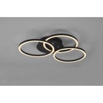 Czarna lampa sufitowa LED z trzema okrągłymi punktami świetlnymi, z białymi krawędziami, zamontowana na sufitowej podstawie. Widok z dołu, ukazujący nowoczesny design. Produkt wyposażony w pilot do zdalnego sterowania.