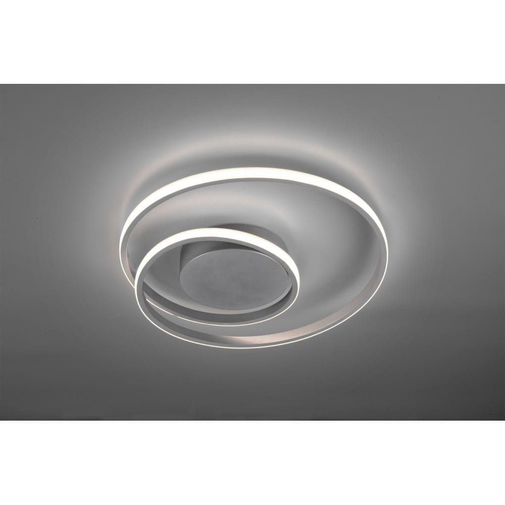Tytanowa lampa sufitowa Zibal LED w formie spiralnej, z dwoma okrągłymi pierścieniami emitującymi białe światło. Montowana na suficie, o minimalistycznym designie, w kolorze tytanowym, z centralnym okrągłym elementem.