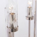 Lampa wisząca Oxford 10-punktowa P10069NI z metalowym stelażem w chromowanym wykończeniu, z przezroczystymi, szklanymi kloszami w falistym kształcie, w zbliżeniu na detale oprawy i źródła światła.
