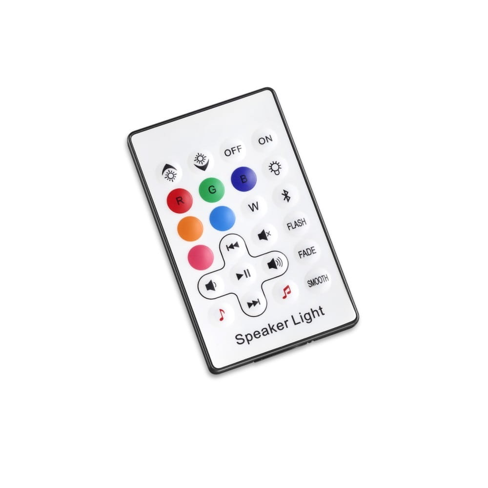 Pilot do lampy stołowej Jamaica LED, biały, z przyciskami w różnych kolorach (RGB, biały) oraz funkcjami FLASH, FADE, SMOOTH. Wyposażony w kontrolę głośności i odtwarzania. Prosty układ, przeznaczony do zdalnego sterowania lampą.