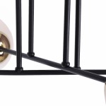 Czarna lampa sufitowa 4-punktowa Isla K-4914 z metalowymi elementami w odcieniu patyny. Widoczne cztery ramiona z okrągłymi kloszami, montaż w pozycji poziomej. Gładka powierzchnia, prosty design. Tło białe, co podkreśla detale lampy.