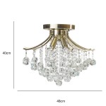 Lampa sufitowa Wenecja, 4-punktowa, wykonana z mosiądzu. Okrągła podstawa z mosiężnymi ramionami, z których zwisają kryształowe kulki. Wymiary: wysokość 40 cm, średnica 48 cm. Elegancki design z kryształowymi dekoracjami.