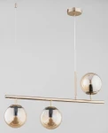 Lampa wisząca Abakus 3-punktowa w kolorze złotym. Posiada trzy szklane klosze w kształcie kul, zawieszone na metalowej rurze. Klosze są transparentne, a lampa ma minimalistyczny design, zawieszona na cienkim przewodzie.