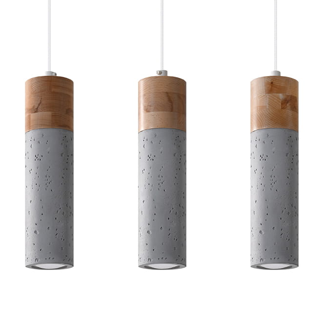 Lampa wisząca 3-punktowa Zane w szarym kolorze. Cylindryczne klosze z betonu z widocznymi teksturami, u góry drewniane wykończenie. Zawieszenie na białym przewodzie. Produkt w pozycji wiszącej, pokazany z przodu.