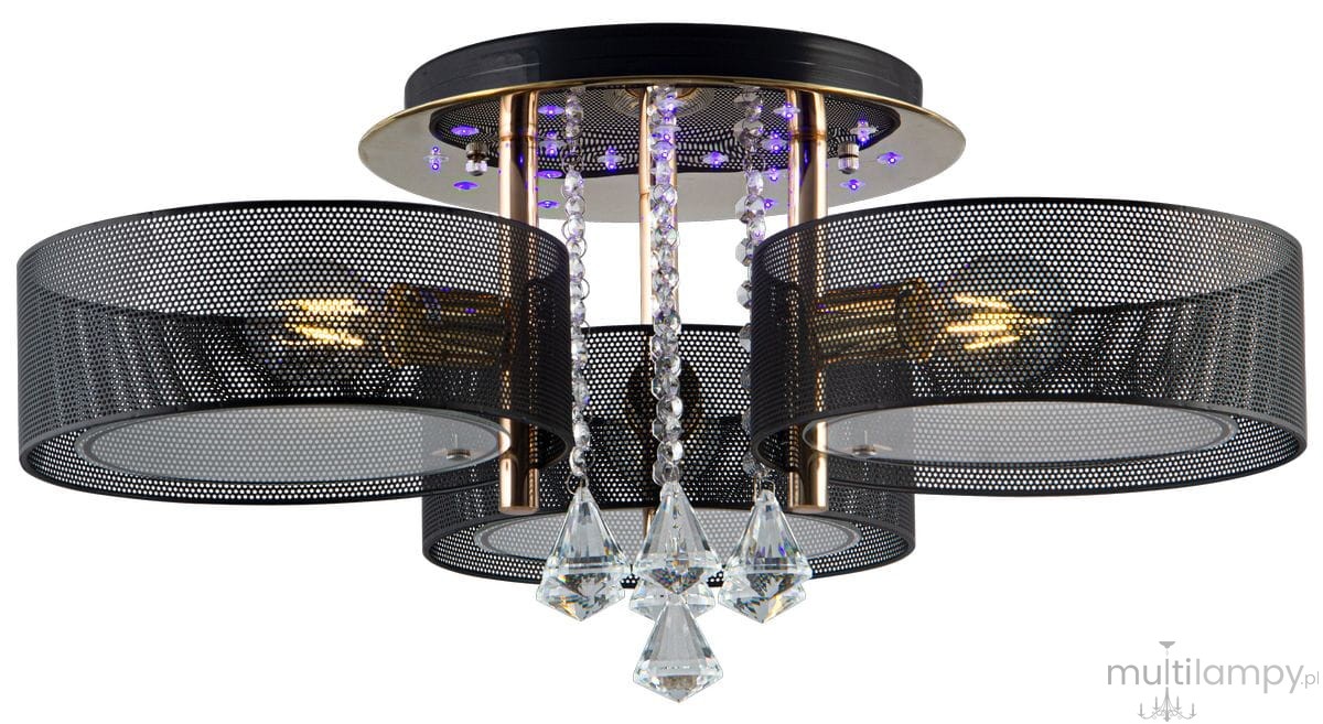 Lampa sufitowa Antila E27 z trzema punktami świetlnymi, w złotej i czarnej siatce. Wyposażona w kryształowe detale i pilot zdalnego sterowania. Ujęcie frontalne, zamontowana na suficie, z widocznymi diodami LED.
