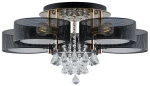 Lampa sufitowa Antila E27 w kolorze złotym i czarnym, pięciopunktowa, z metalowymi kloszami w siatkę. Zawiera kryształowe zdobienia, podwieszane na łańcuszkach. Ujęcie frontalne, lampy wiszące z równomiernym rozmieszczeniem.