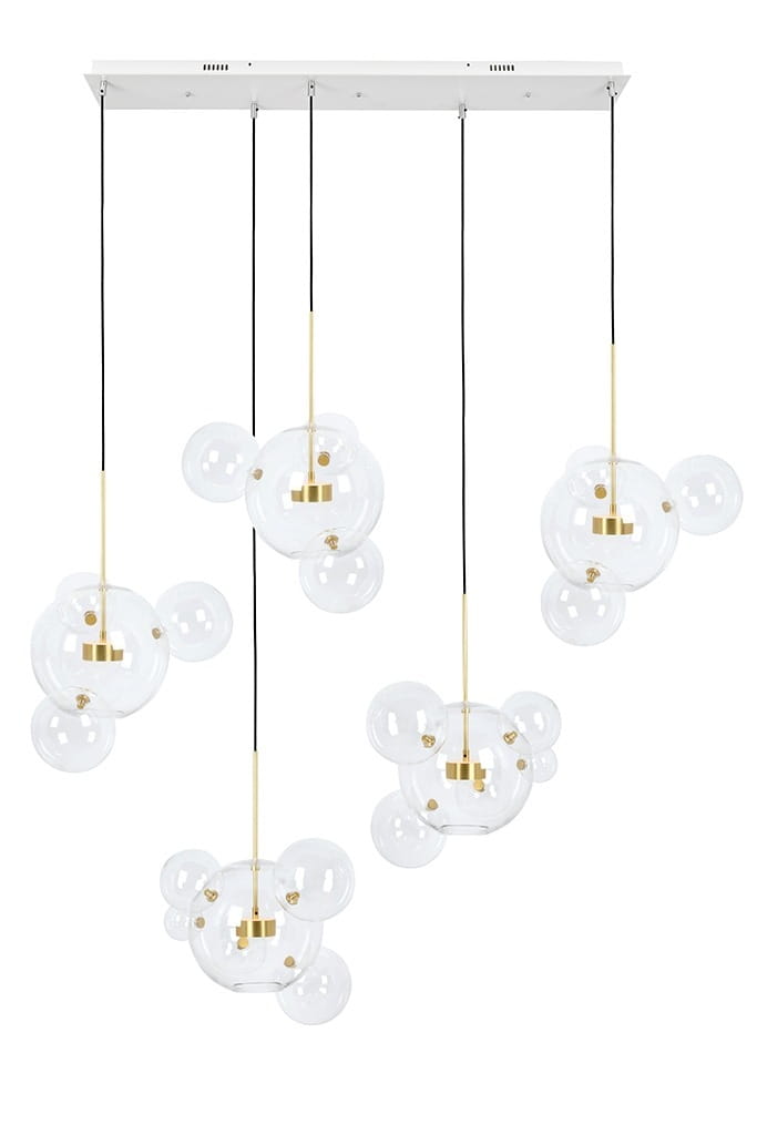 Złota lampa wisząca Capri Line z pięcioma przezroczystymi kloszami w kształcie bąbelków, zawieszona na czarnych linkach. Utrzymana na białym stelażu, idealna do nowoczesnych wnętrz.
