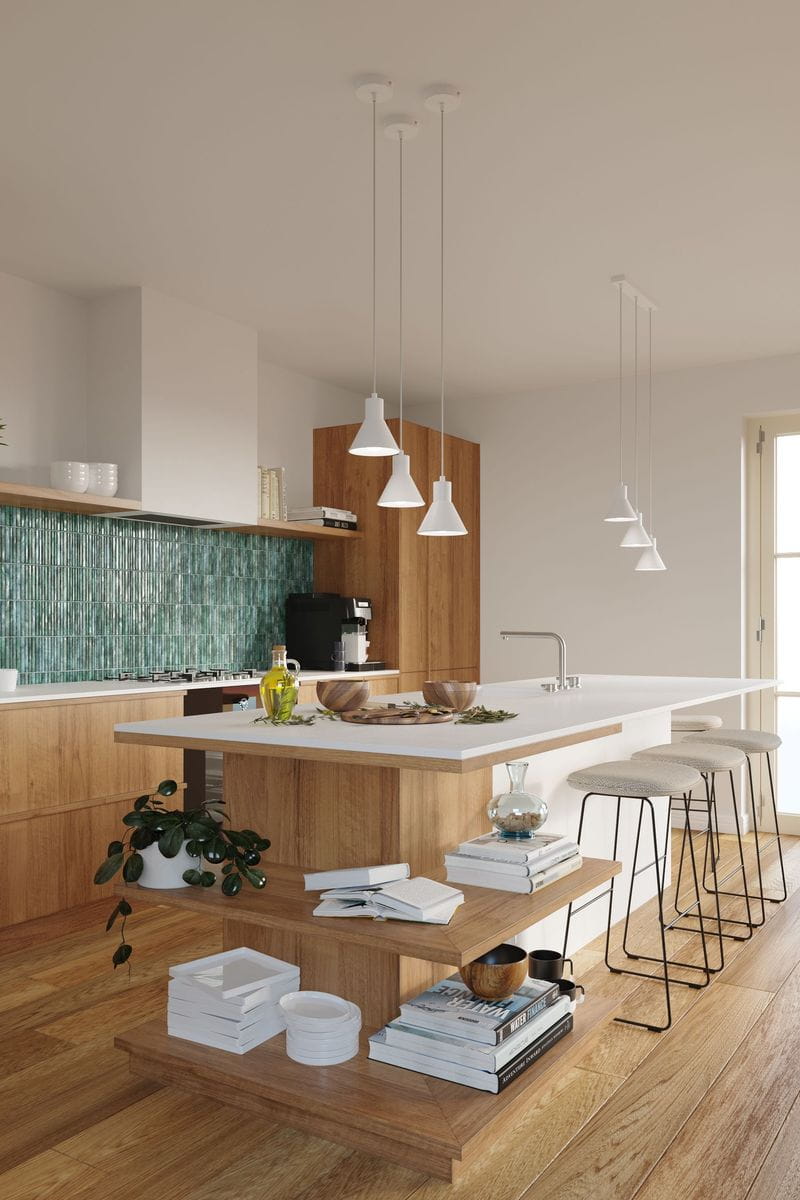Lampa wisząca 1-punktowa w białym kolorze, o minimalistycznym kształcie, zawieszona na cienkim kablu w nowoczesnej kuchni. W tle widoczne drewniane meble i zielona backsplash. Stylowe akcesoria na blacie kuchennym.