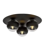 Trójpunktowa lampa sufitowa w kolorze czarnym z przezroczystymi kloszami. Ułożona płasko, z trzema żarówkami o widocznych filamentach. Metalowa podstawka o okrągłym kształcie, minimalistyczny design.