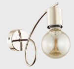 Kinkiet Tango 1-punktowy w kolorze złotym, z okrągłą podstawą i długim, zakrzywionym ramieniem, zakończony przezroczystą żarówką w kulistym kształcie. Elegancki design, idealny do nowoczesnych wnętrz.