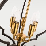 Lampa wisząca Nashville 5-punktowa, z metalowym stelażem w kolorze czarnym i złotymi detalami, prezentująca pięć żarówek w kształcie łzy. Ujęcie zbliżeniowe na elementy montażowe oraz źródła światła. Tło jasne i jednolite.