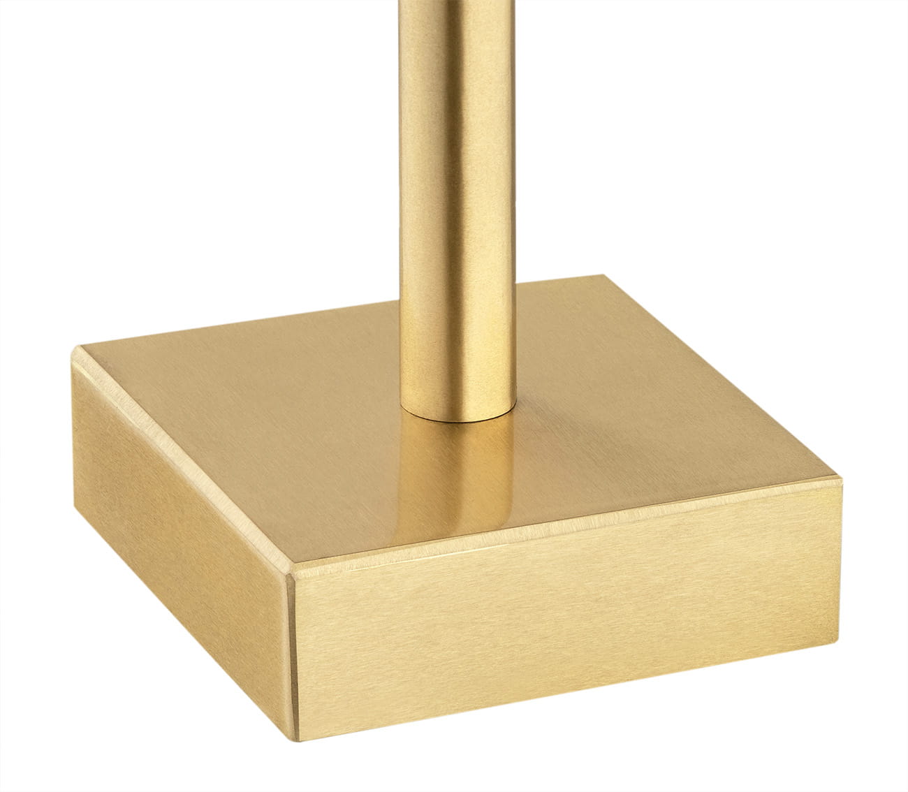 Biała i złota lampka stołowa Abbano 1-punktowa z prostokątną podstawą w kolorze złotym. Widoczny metalowy słupek o gładkiej fakturze, stabilny design. Produkt stoi na płaskiej powierzchni, w zbliżeniu na detale podstawy.