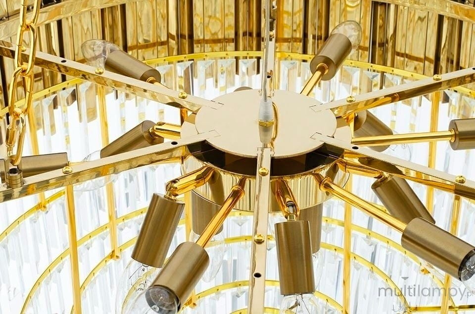 Lampa wisząca Imperial D80 z 16 punktami świetlnymi, w złotym kolorze. Kąt ujęcia z góry ukazuje centralną część z metalowymi ramionami oraz przezroczystymi kloszami, które emitują światło. Elegancki, nowoczesny design z wyraźnymi detalami.