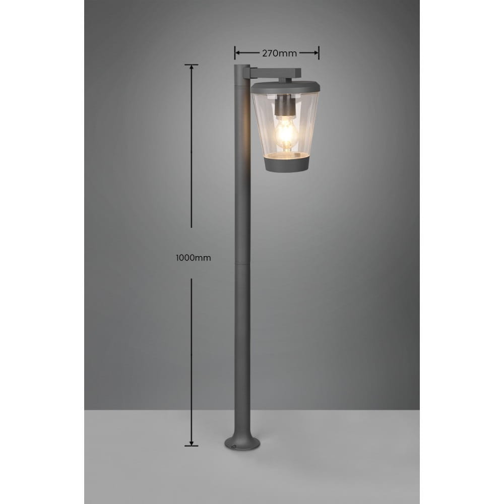 Lampa ogrodowa stojąca Cavado H100 w kolorze antracytowym, wysokość 1000 mm, średnica klosza 270 mm. Posiada przezroczysty klosz z żarówką wewnątrz, zamontowana na prostym słupku, na jednolitym tle.