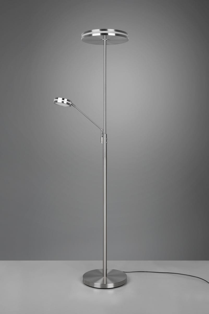 Lampa podłogowa Franklin LED 2-punktowa w wykończeniu matowym niklu. Posiada dwa źródła światła: okrągłą górną oraz regulowaną lampę boczną. Stojąca na okrągłej podstawie, z cienkim, stalowym stelażem. Idealna do nowoczesnych wnętrz.