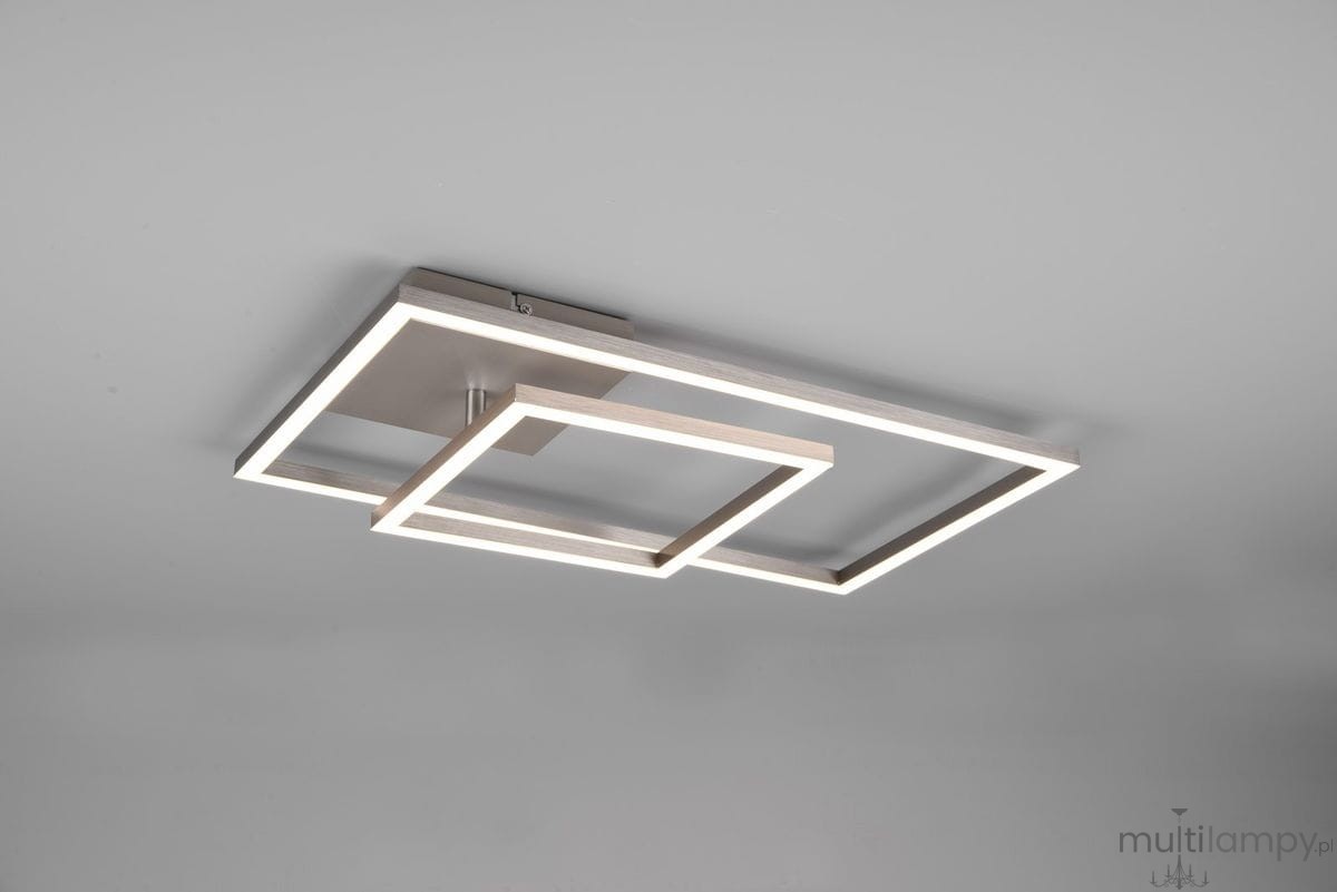 Lampa sufitowa Padella LED 4000K w kolorze niklowym, z dwoma prostokątnymi ramkami, zamontowana na płaskiej podstawie. Ujęcie z dołu, ukazuje minimalistyczny design i podświetlenie krawędzi. Tło jasnoszare, co podkreśla formę lampy.
