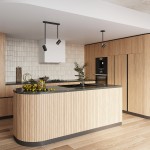 Czarna lampa sufitowa Norano 2-punktowa z regulowanymi reflektorami w kuchni. Ujęcie z góry pokazuje lampę zawieszoną nad wyspą kuchenną, w tle drewniane meble i nowoczesny sprzęt AGD.