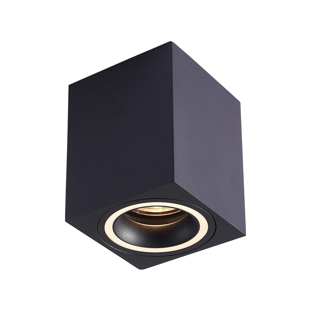 Czarna lampa sufitowa Bima Ring Square 1-punktowa w kształcie sześcianu, z okrągłym źródłem światła w centralnej części i białym obrzeżem. Ujęcie z dołu, eksponujące minimalistyczny design i matową fakturę.