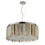 Lampa wisząca Clarissa 5-punktowa w kolorze chromu. Okrągła, z przezroczystymi kryształkami w formie prostokątów na obrzeżu, zawieszona na cienkim przewodzie. Posiada metalowy sufitowy uchwyt. Idealna do nowoczesnych wnętrz.