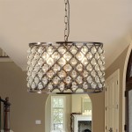 Lampa wisząca Marquise 3-punktowa w kolorze antycznej miedzi, z ozdobnym kloszem z kryształowymi elementami w kształcie kropli. Produkt zawieszony na łańcuchu, umiejscowiony w jasnym wnętrzu, z widocznym odbiciem w lustrze.