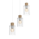 Lampa wisząca Madera 3-punktowa w białym kolorze z przezroczystymi kloszami szklanymi i drewnianymi elementami. Zawieszona na białych linkach. Klosze mają cylindryczny kształt, ukazując żarówki w ich wnętrzu.