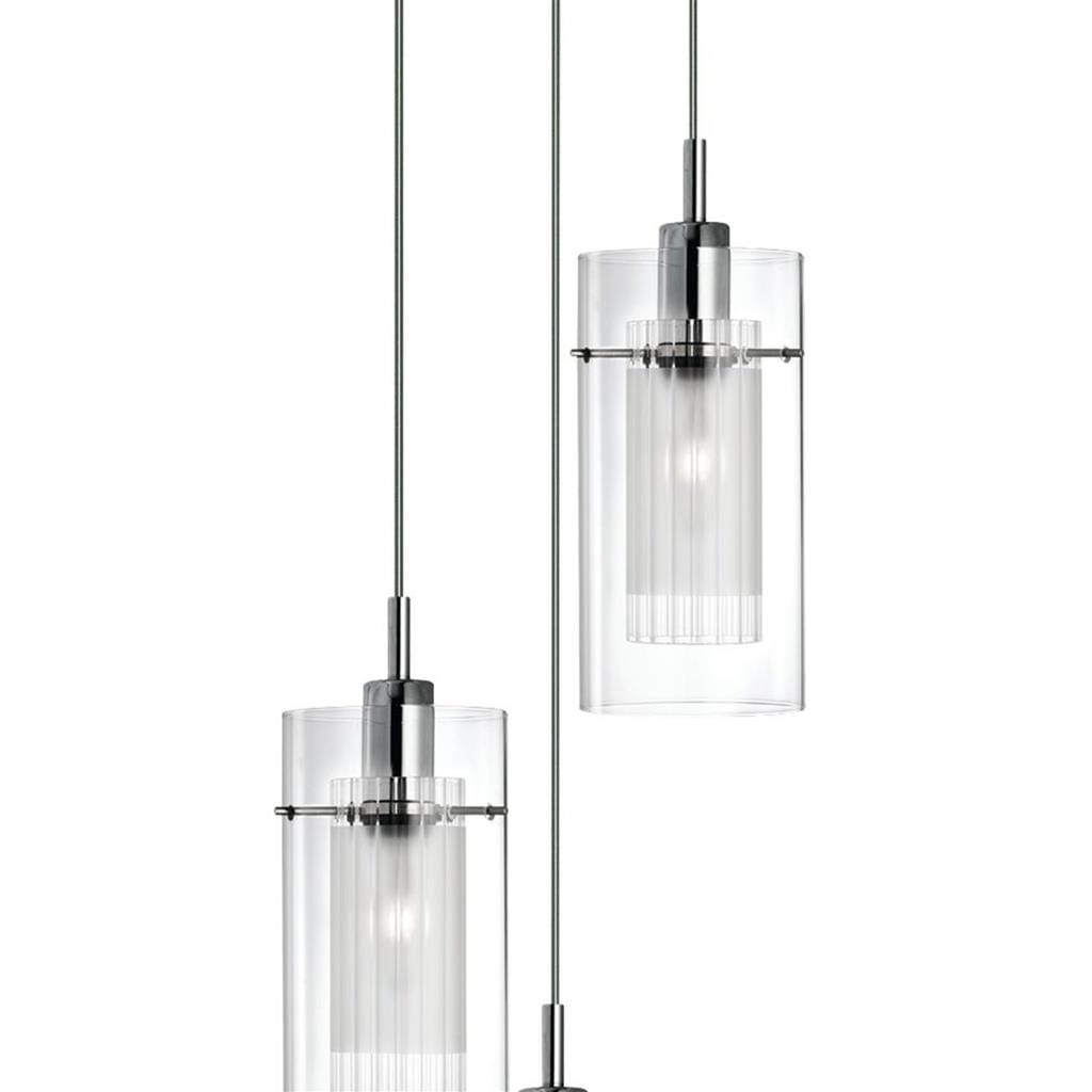 Lampa wisząca Duo I 3-punktowa w srebrnej satynie i przezroczystym kloszu. Trzy cylindryczne klosze z przezroczystego materiału, z widocznymi źródłami światła, zwisające na cienkich linkach, w układzie asymetrycznym.