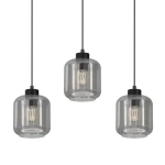 Lampa wisząca Sombra 3-punktowa w kolorze czarnym z dymionymi kloszami. Klosze mają cylindryczny kształt, zawieszone na cienkich czarnych linkach. Widoczne żarówki nadają ciepłe światło, a całość prezentuje nowoczesny styl.