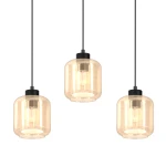 Lampa wisząca Sombra 3-punktowa z czarnymi akcentami i bursztynowymi szklanymi kloszami. Klosze mają okrągły kształt, zawieszone na cienkich linkach, emanują ciepłym światłem, tworząc przytulną atmosferę.