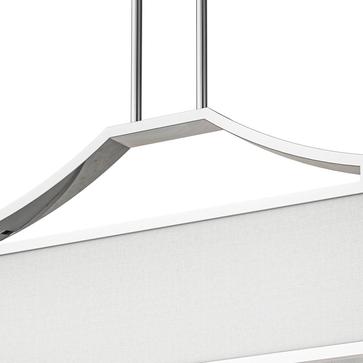 Lampa wisząca Gerdo Ovale Cromo, 4-punktowa, z chromowanym wykończeniem. Posiada owalny kształt i białą tekstylną osłonę. Zawieszona na dwóch metalowych linkach, widoczna z góry, w jasnym tle.