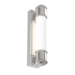Kinkiet Omi Parette Cromo 30 IP44 w kolorze chromu, z cylindrycznym, białym kloszem. Montaż w pionie, z widocznym mocowaniem na dole. Oświetlenie LED, idealne do łazienek i stref mokrych. Proste tło podkreśla elegancki design lampy.