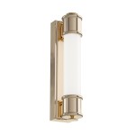 Kinkiet Omi Parette Gold 30 IP44 LED w złotym wykończeniu, o cylindrycznym kształcie z mlecznym kloszem. Pozycjonowany pionowo, z widocznymi detalami w postaci metalowych elementów oraz minimalistycznym designem, idealny do oświetlenia wnętrz.