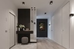 Czarna lampa wisząca 1-punktowa Quad SL.0060, zawieszona w korytarzu, z kwadratowym kloszem. W tle widoczny ciemny fragment ściany z obrazem oraz mebel z dekoracjami. Oświetlenie podkreśla nowoczesny charakter wnętrza.