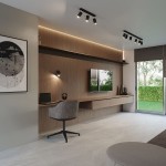 Czarna, 3-punktowa lampa sufitowa typu spot, zamontowana na suficie, z trzema regulowanymi punktami świetlnymi. Oświetlenie w nowoczesnym wnętrzu, w tle widoczna ściana z drewnianą półką oraz okno z widokiem na zieleń.