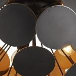 Czarna lampa sufitowa 3-punktowa Discus z okrągłymi kloszami. Widok z dołu, ukazujący czarne, matowe panele i żarówki w złotych oprawach. Metalowa konstrukcja z wyeksponowanymi elementami mocującymi.
