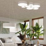 Lampa sufitowa Arena 25, biała, z okrągłym kloszem, montowana na suficie. W tle widać rośliny doniczkowe oraz minimalistyczny wystrój wnętrza z kanapą i stolikiem.