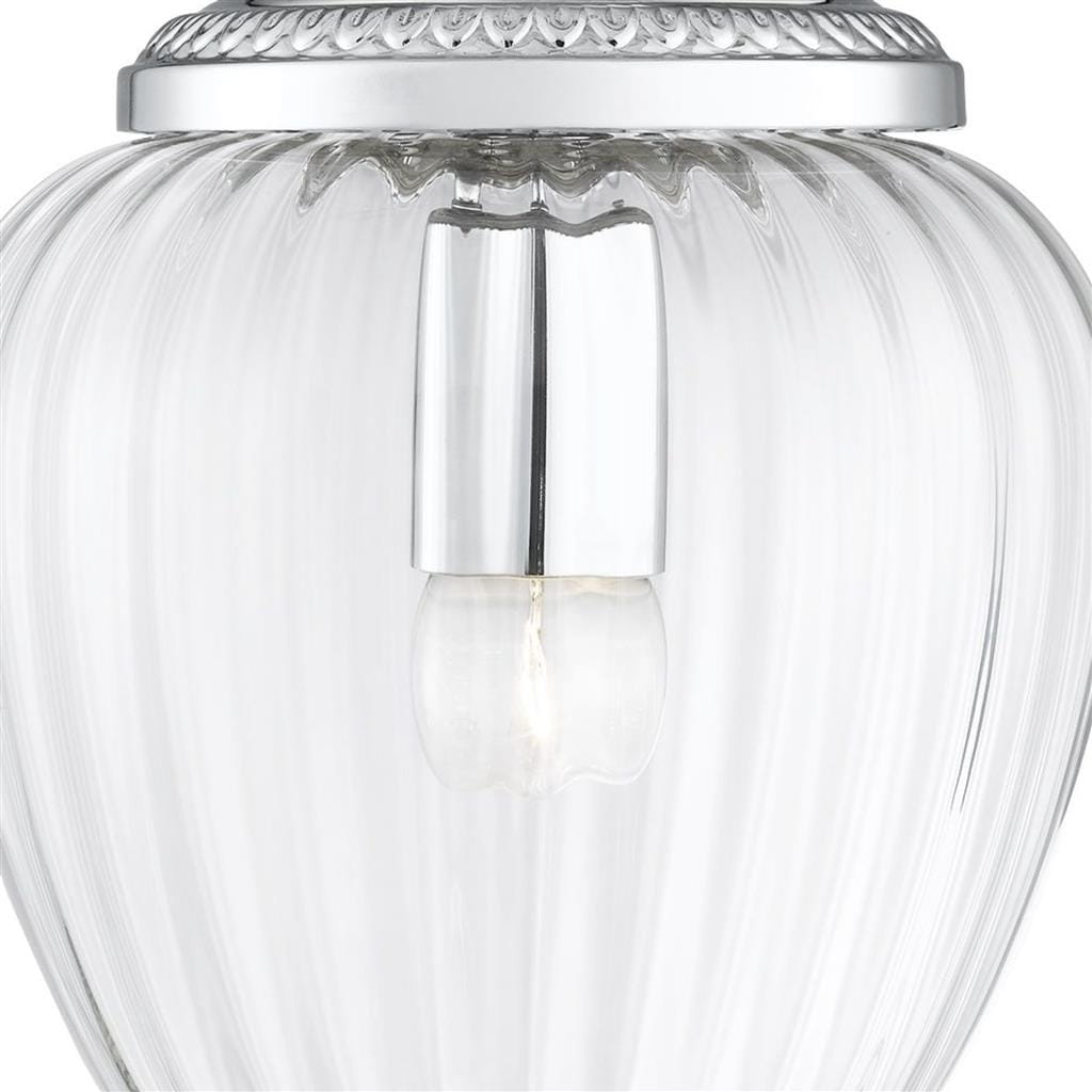 Lampa wisząca Moscow 1-punktowa w kolorze chromu. Szklany klosz o delikatnych żeberkach, z widoczną żarówką. Górna część z chromowanym wykończeniem, wisząca konstrukcja. Idealna do nowoczesnych wnętrz.