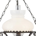 Lampa wisząca Oil w stylu rustykalnym, brązowa, z białym szklanym kloszem o zaokrąglonym kształcie. Zawieszona na metalowym łańcuchu, z ozdobnym brzegiem. Widoczne elementy mocujące i żarówka w środku.
