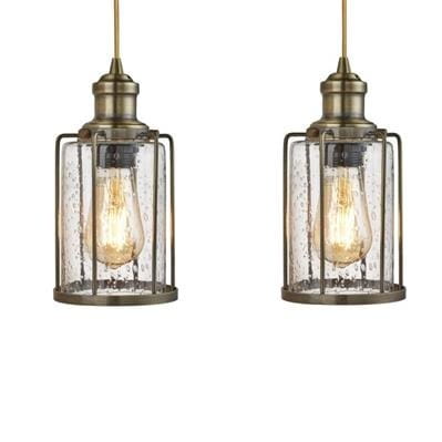 Lampa wisząca 4-punktowa w antycznym mosiądzu, z przezroczystymi kloszami o strukturze kropli wody. Widoczne żarówki E27, umieszczone w metalowej ramie. Klosze zawieszone na cienkich linkach. Elegancki, industrialny design.