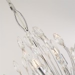 Lampa wisząca Peacock 14-punktowa w chromowanym wykończeniu, z kryształowymi detalami w kształcie liści. Widoczna część zawieszenia oraz elementy świetlne. Elegancka konstrukcja z lśniącymi akcentami, idealna do nowoczesnych wnętrz.