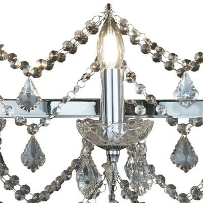Lampa wisząca Florence 14-punktowa w chromie. Eleganckie, przezroczyste kryształy w kształcie kropli oraz świeczkowe źródła światła. Detale metalowe i dekoracyjne łańcuchy z kryształków, tworzące efektowną aranżację.