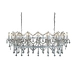 Lampa wisząca Florence 14-punktowa w kolorze chromu, z dekoracyjnymi kryształkami i łańcuchami. Ułożona poziomo, z widocznymi źródłami światła w formie świeczek, zawieszona na łańcuchu. Elegancki design, idealna do dużych wnętrz.