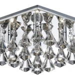 Lampa sufitowa 4-punktowa w kwadratowej obudowie chromowanej, ozdobiona przezroczystymi kryształowymi elementami w kształcie piramid. Widok z góry, ukazujący detale mocowania i rozmieszczenie źródeł światła.