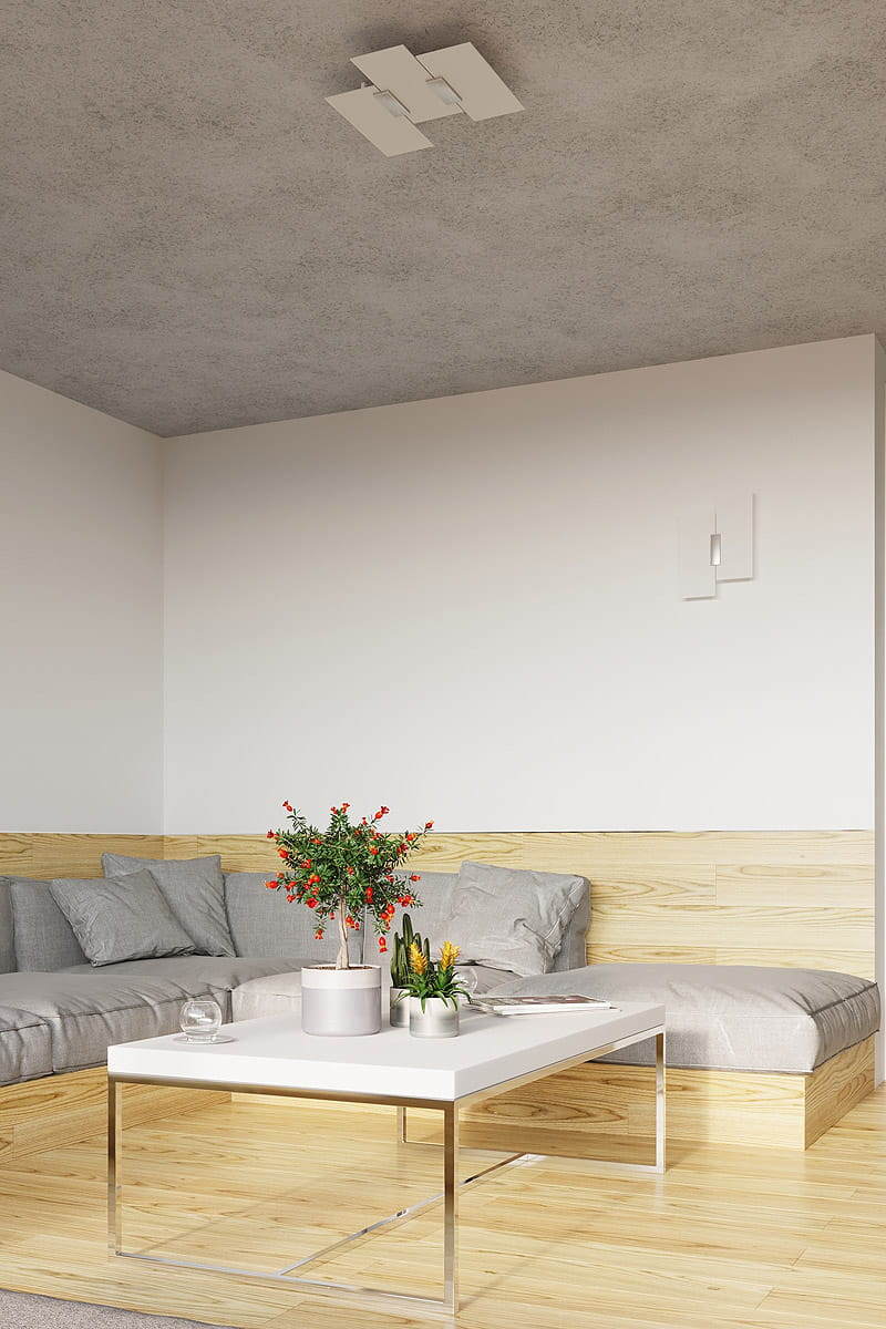 Kinkiet Fabiano 2-punktowy SL.0197 w kolorze białym, montowany na ścianie, z minimalistycznym designem. Widoczny w nowoczesnym wnętrzu z kanapą i stolikiem. Oświetlenie skierowane na ścianę, podkreślające aranżację.
