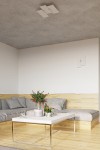 Lampa sufitowa Fabiano 3-punktowa SL.0198 w kolorze białym, zamontowana na szarym suficie. Posiada trzy źródła światła w formie prostokątnych paneli. Otoczenie to minimalistyczny salon z szarym narożnikiem i drewnianą podłogą.