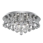 Lampa sufitowa Hanna, 6-punktowa, okrągła, chromowana. Zawiera kryształowe elementy w kształcie trójkątów, zawieszone na metalowej podstawie. Oświetlenie w stylu nowoczesnym, wiszące, z równomiernym rozkładem światła.